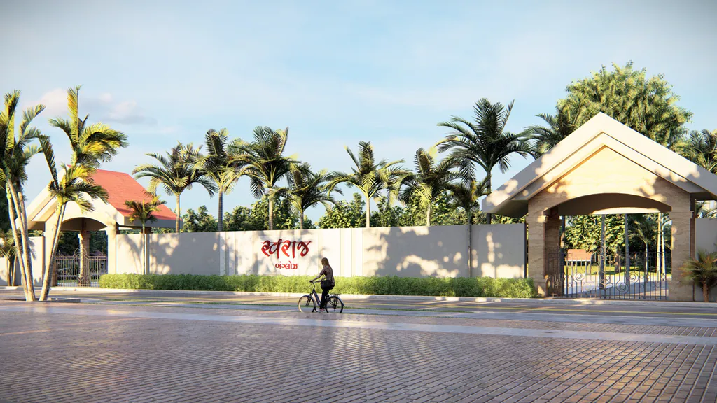 The Swaraj Bungalows entrance: a gabled gate in the compound wall, with the Swaraj sign and palms