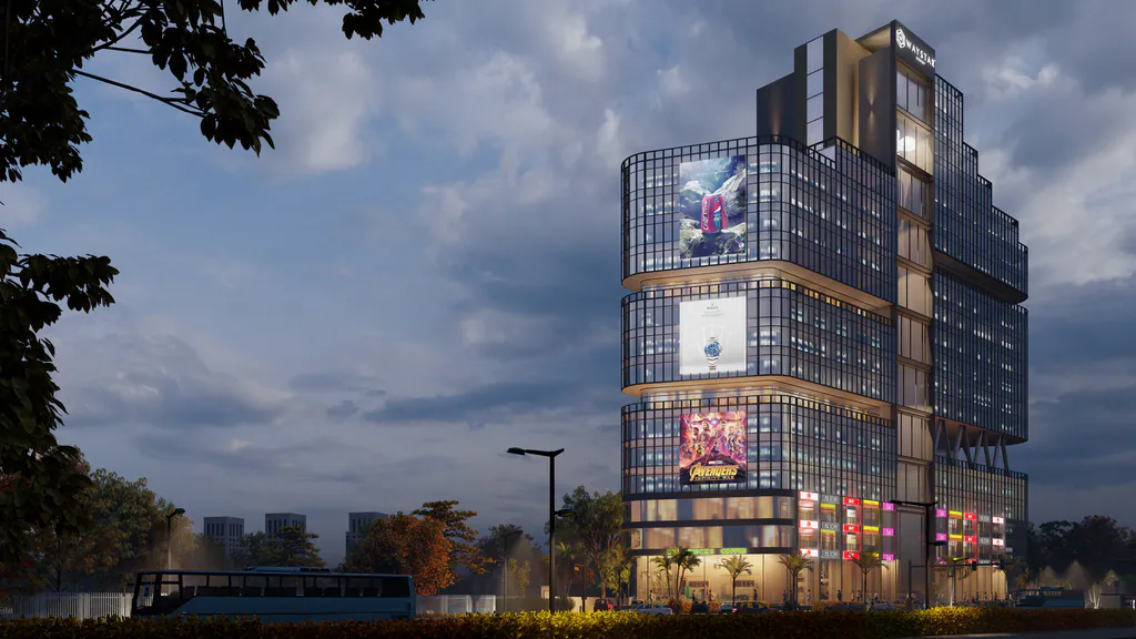 The Waystar at dusk: a tower of stacked glass bands with lit media screens over a retail podium